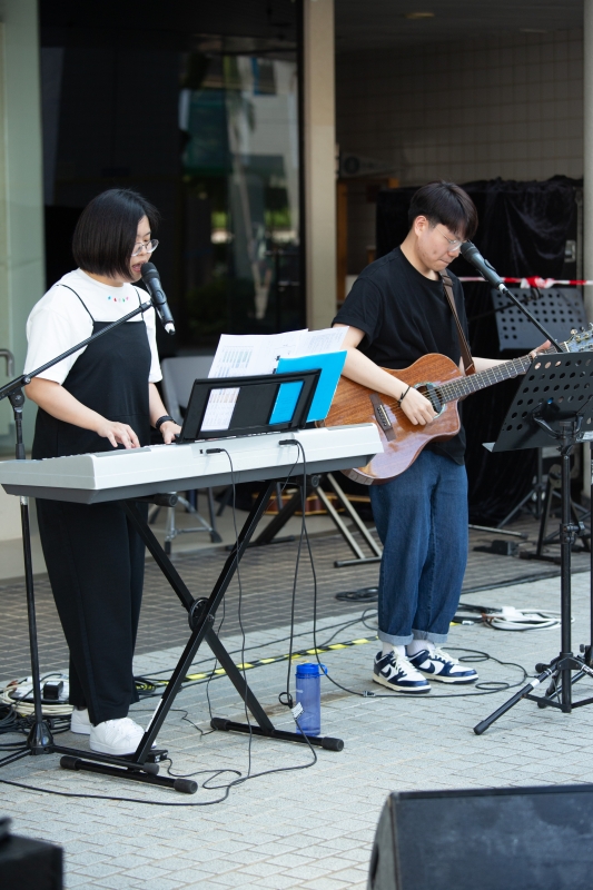 A Busking area with musical performances by students of HKUST