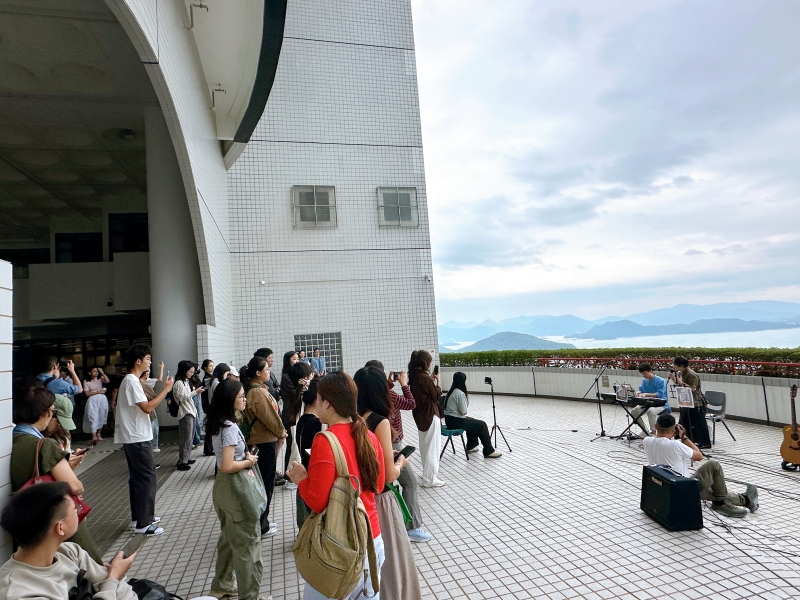 Busking performances in the mushroom area, where our students from diverse backgrounds shared their love of music.